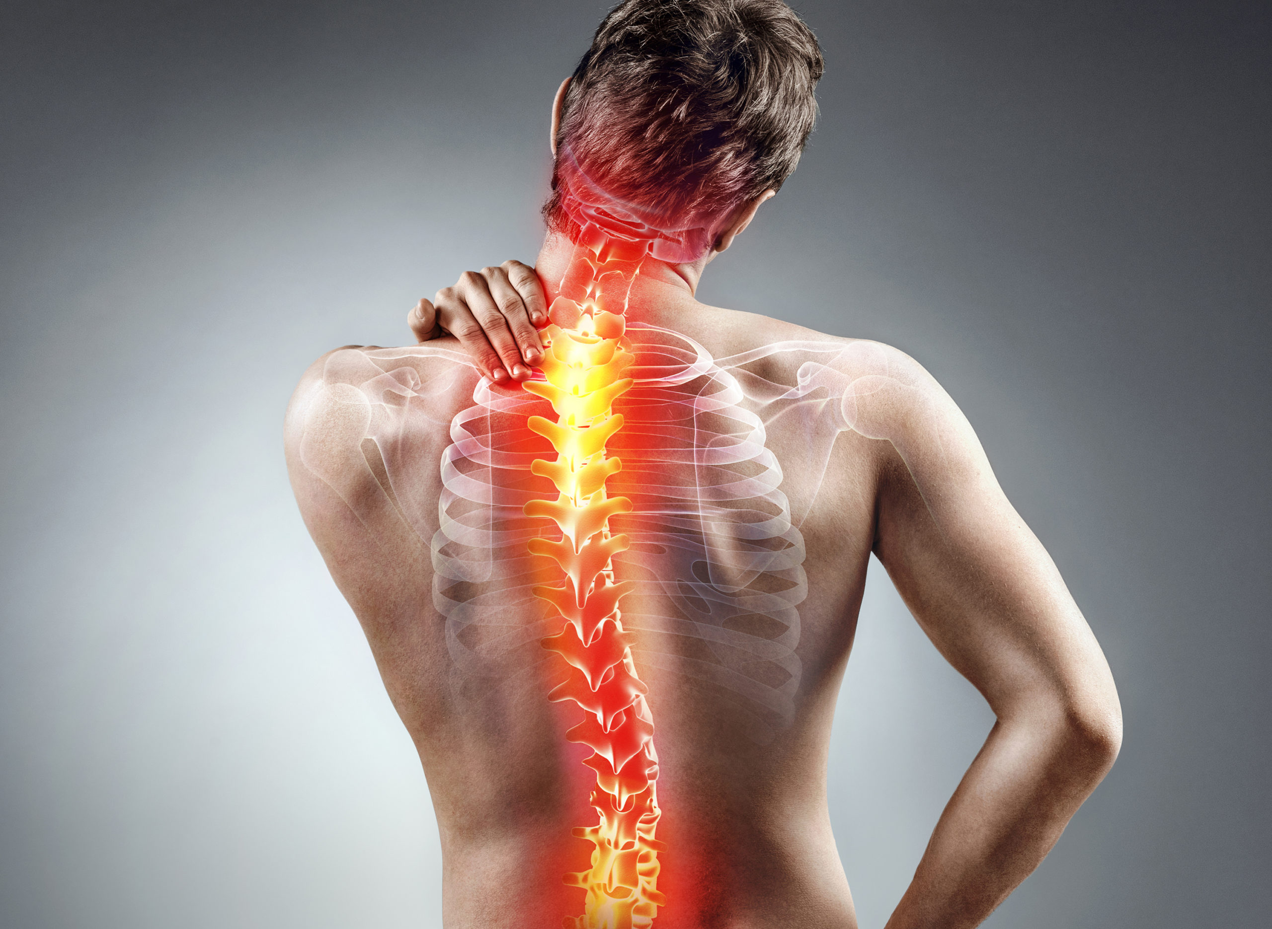 Patient receiving manual therapy for chronic back or neck pain at NBR Clinic Lahore